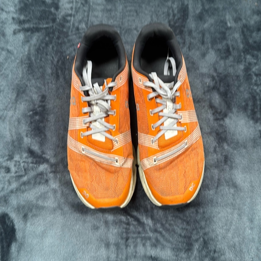 On Cloudgo Turmeric (Orange) and Aloe Shoes
